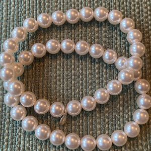 Two RMN faux pearl stretch bracelets